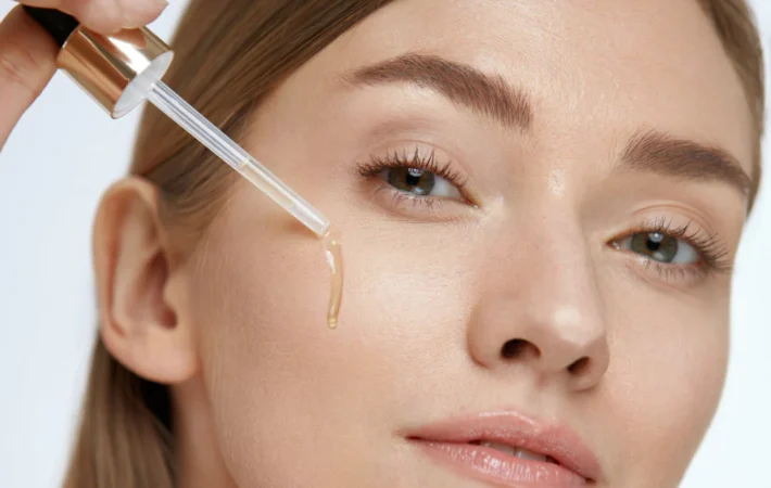 Cica skincare benefits and how to use for glowing skin - Centella Asiatica product on green background