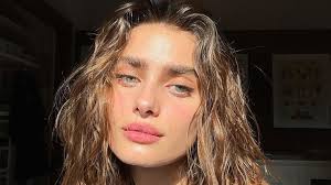 Three Shaheencosmetics products rose water mist hydrating gel and sunscreen arranged on clean white surface representing less is more beauty